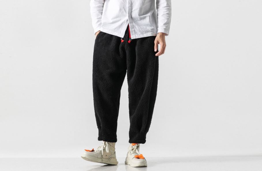 Man Wearing Black Lambswool Warm Thick Pants in Winter for both Men and Women