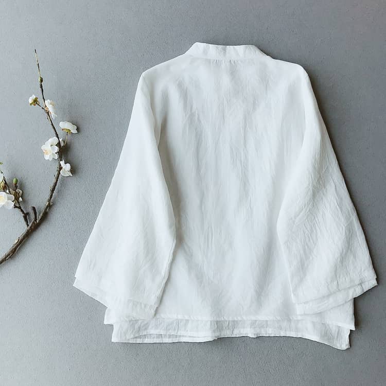 Back of a white double layers qipao blouse