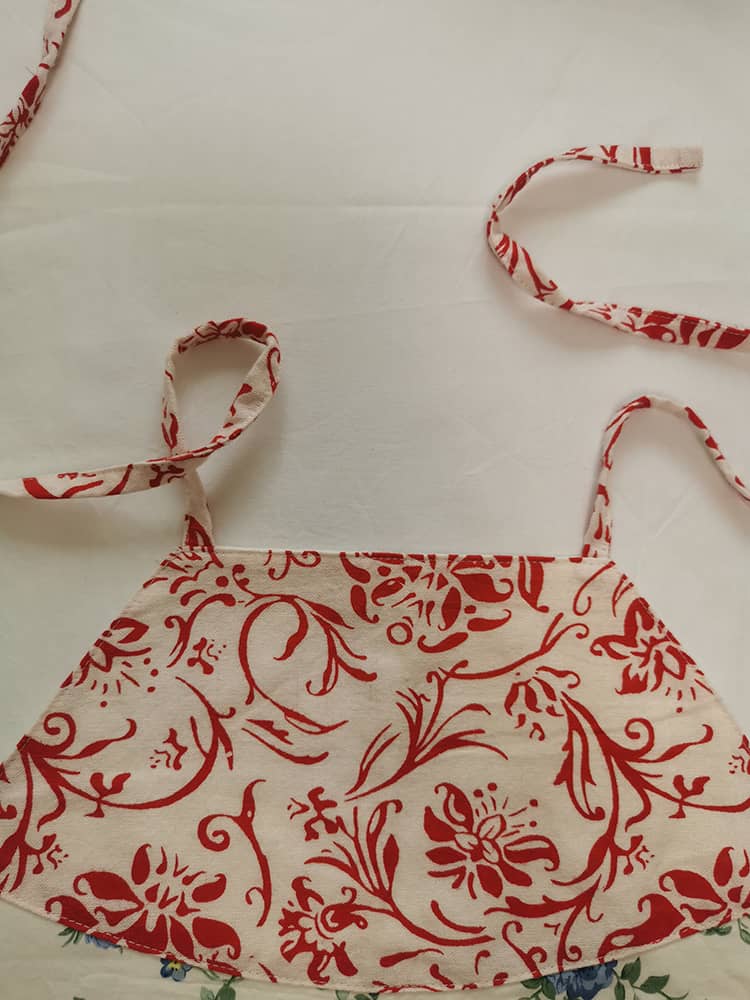 Detail of Ancient Chinese Underwear with Red Porcelain Flowers Patterns and Straight Neckline