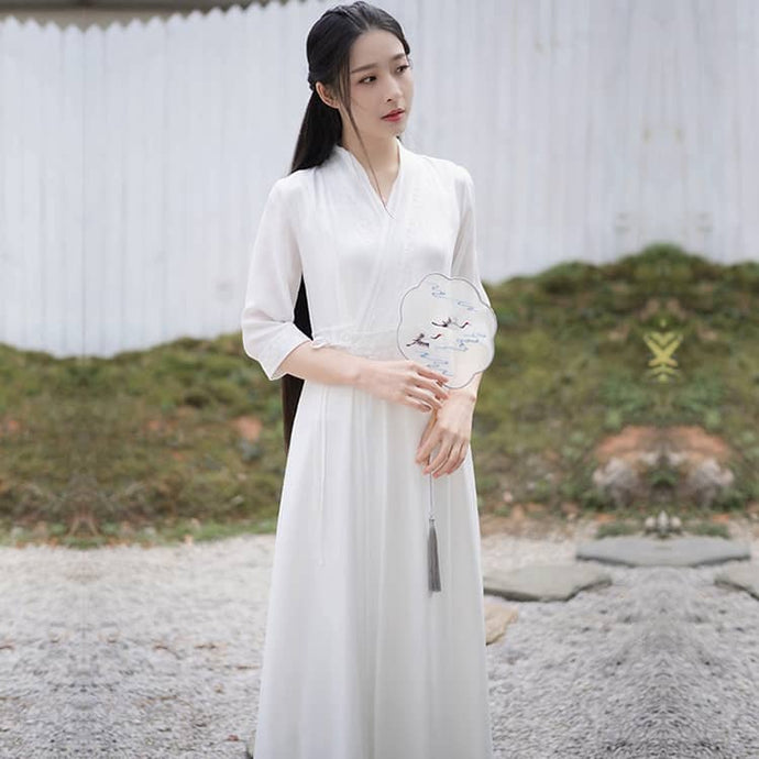 A woman with a white hanfu dress