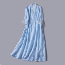 Load image into Gallery viewer, Front of a blue modern hanfu dress with embroidery patterns
