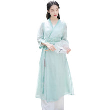 Load image into Gallery viewer, A woman with a green modern hanfu dress with waistband
