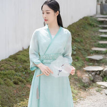 Load image into Gallery viewer, A woman with a green modern hanfu dress with waistband
