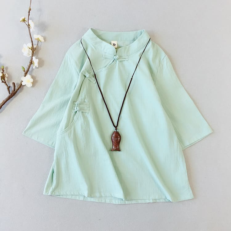 Green qipao blouse with short sleeves