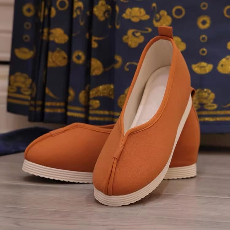 Orange traditional Chinese shoes for women in Qing dynasty