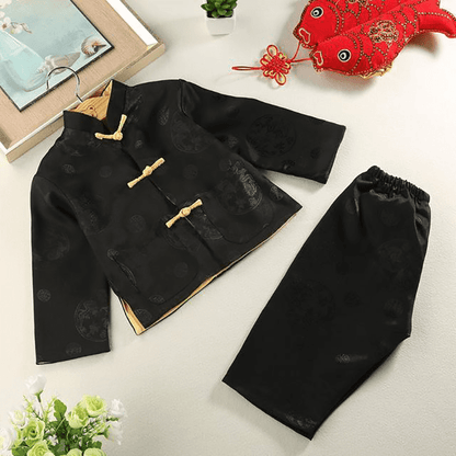 front of the black tang suit for kid in Chinese new year